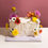 Thumbnail: Floral buttercream cake with textured finish and colourful fresh flowers