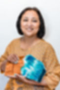 Gauri holding art work