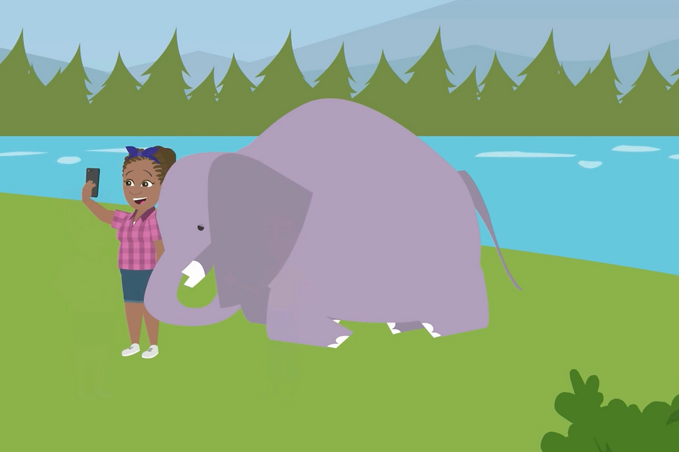 A woman taking a selfie with an elephant