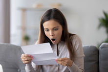 Tax professional Tetiana Voita helping taxpayers analyze IRS CP2000 letters, missing 1099 brokerage income, and cost basis adjustments to avoid unnecessary penalties.