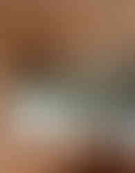 Cozinha com azulejo verde e madeira nogueira