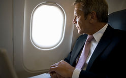 Alguien Flying Business Class