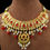 Thumbnail: Rajputi Gold-Plated Bridal Choker with Ruby Stones & Pearl Drops