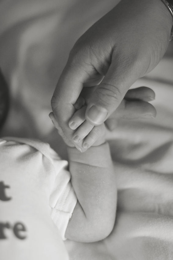 JJ_Newborn_hand_and_mine.jpg