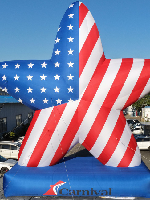 Large patriotic star inflatable for Carnival’s 250th anniversary cruise celebration and onboard activities.