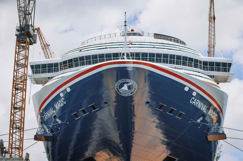 Carnival Magic shows the From Sea to Shining Sea bow crest for Carnival’s 250th anniversary cruise celebration.