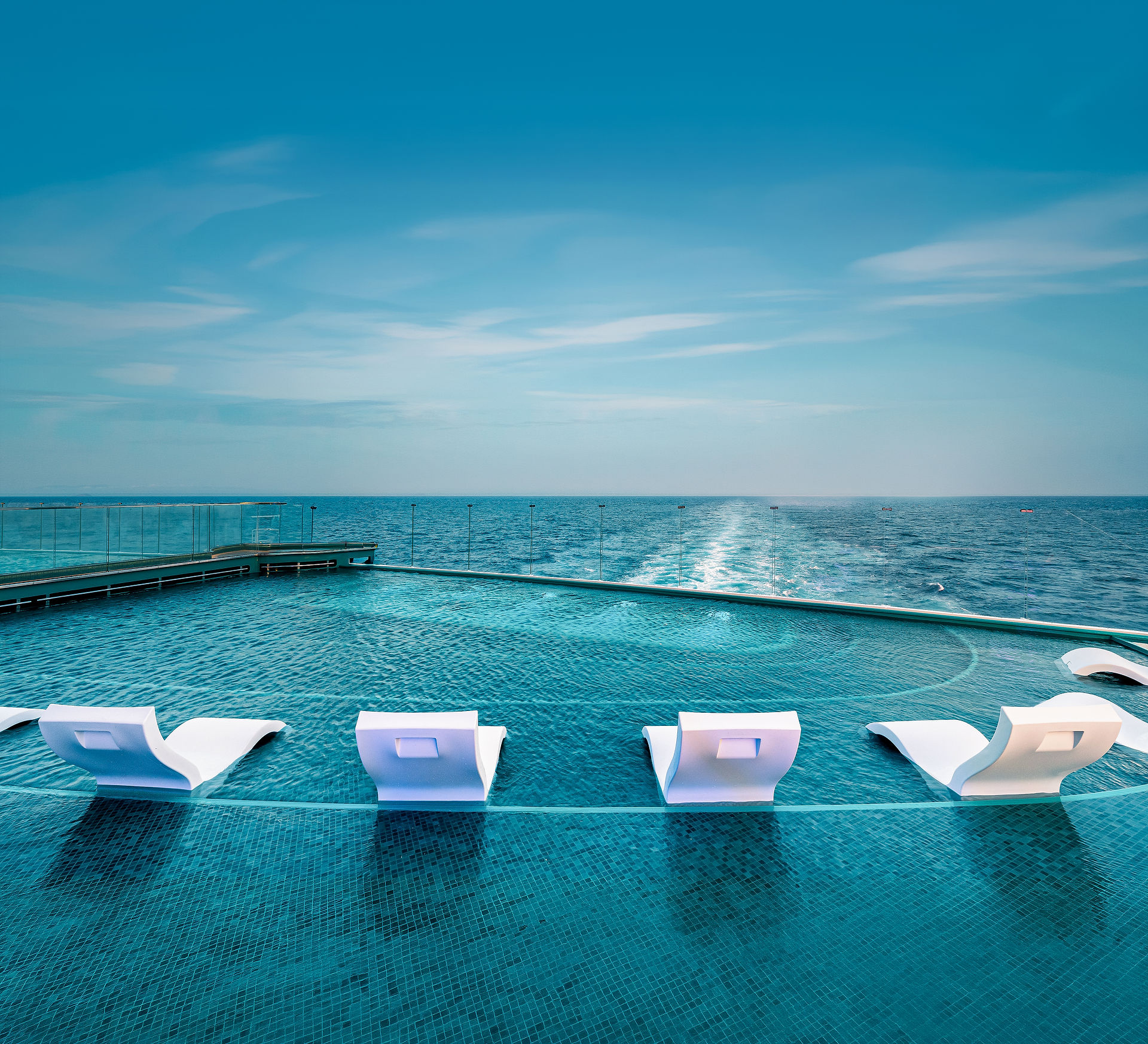Infinity pool onboard MSC Seascape overlooking the ocean during a cruise vacation.