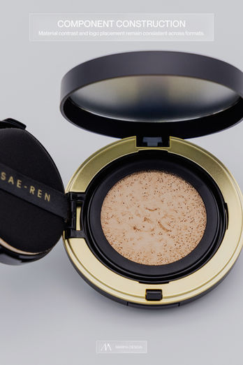 Open black and gold cushion compact showing controlled material contrast and consistent logo placement.