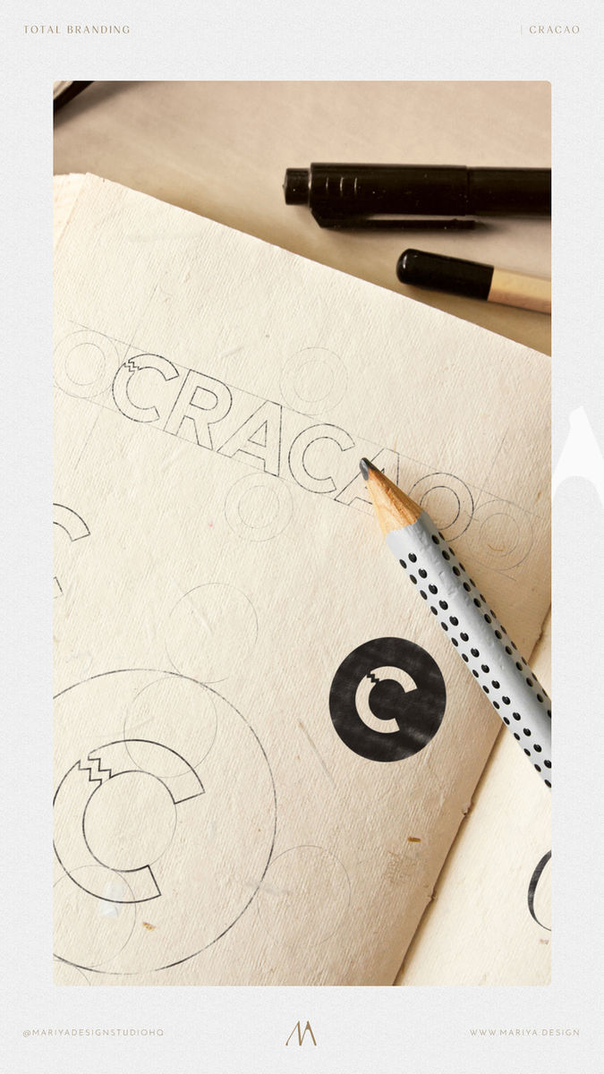 Cracao brand stationery and embossed logo application showing refined identity details and tactile execution