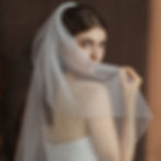 The Emilee veil, adorned with pearls and crystal offers a romantic touch to bridal ensembles
