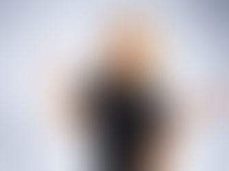 Woman shrugging shoulders