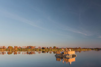Sunset cruise in the Okavango delta. A regualr experience at the Luxury lodge