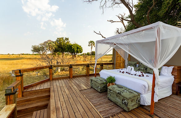 A view of the bed on the sleep out deck at Camp Okavango
