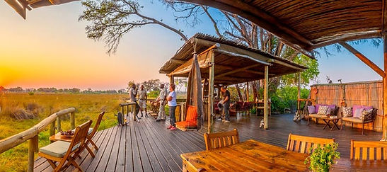 A scenic deck with guests overlooking the Delta landscape