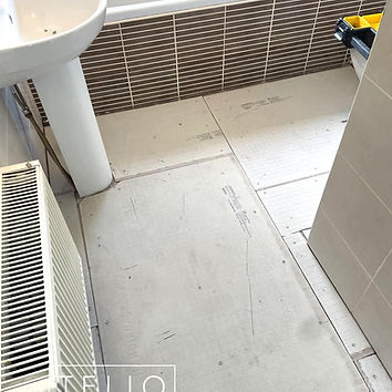 bathroom floor before tiling