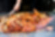 hand-cutting-meat-from-roasted-hog-on-a-spit-2023-11-27-05-01-33-utc.jpg