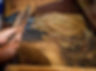 close-up-of-a-person-rolling-tobacco-for-cigars-wi-2023-11-27-05-02-38-utc.jpg