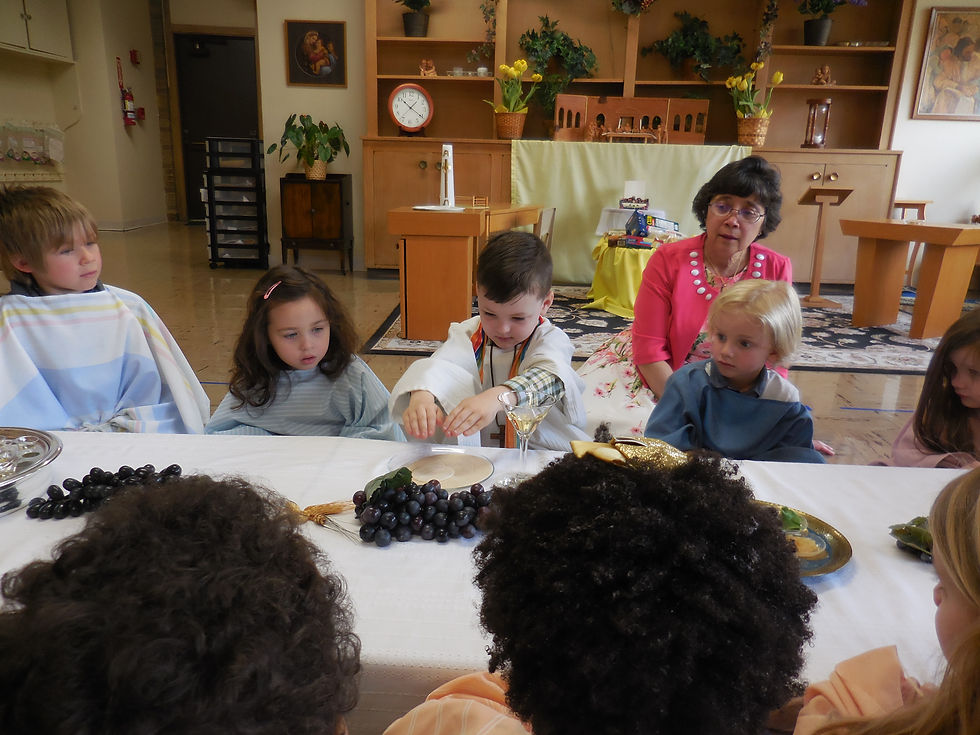 Maria Wood, Head of School, guiding children through a program
