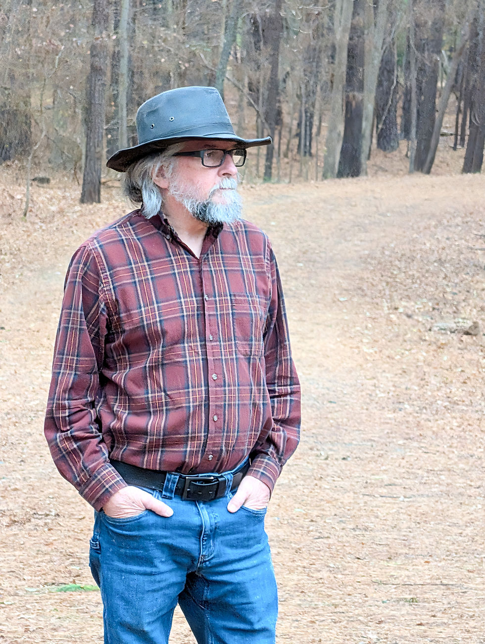 Greg Rowland walking in a forest