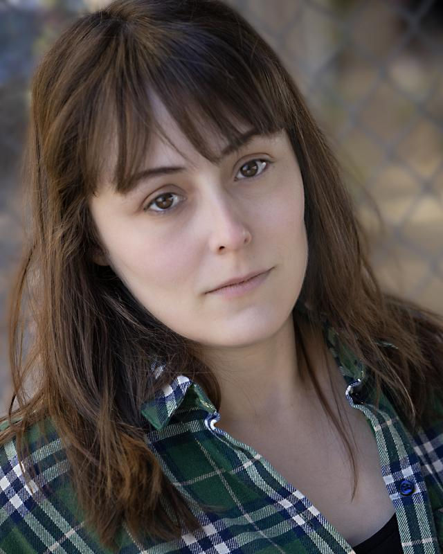 Headshot Nadie Hart plaid.jpeg