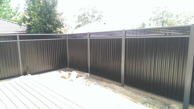 Colorbond Greyridge and Black slotted lattice with sleepers 2