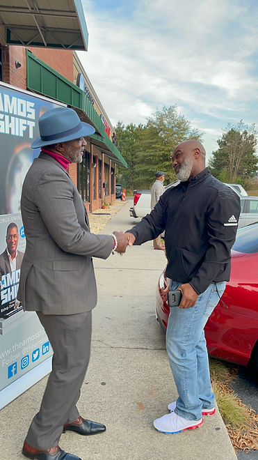 george and man shaking hands.JPG