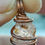 Thumbnail: Gaia Grounder Amulet: Topaz Gemstone/ Antique Copper Coil 