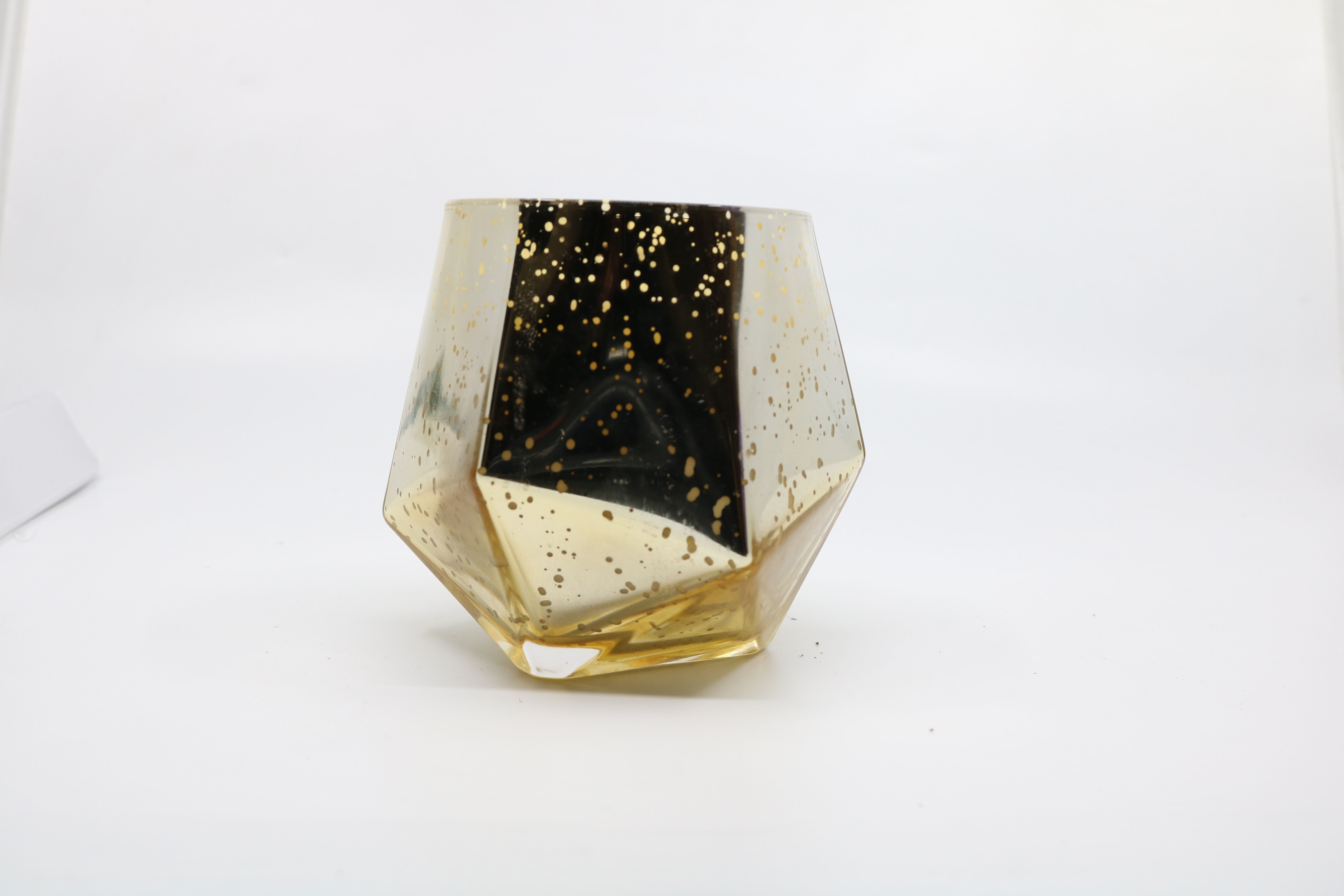 Exceptional geometrical candle vessel in gold mercury glass