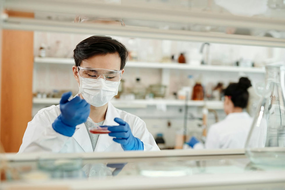clinical pharmacist doing a test on a lab sample
