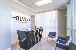 Inside of BLVD Estate. The Reception desk with chairs in our waiting room