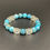 Thumbnail: Matte Blue Crazy Lace Agate and Clear Quartz Beaded Bracelet