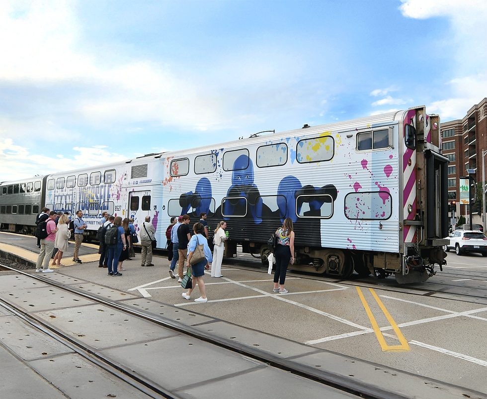 Commuters boarding a Metra train decorated with Blue Man Group graphics.