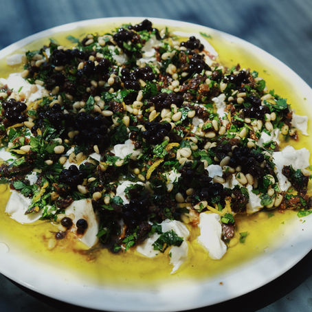 Burrata with pine-nuts, figs and parsley salsa