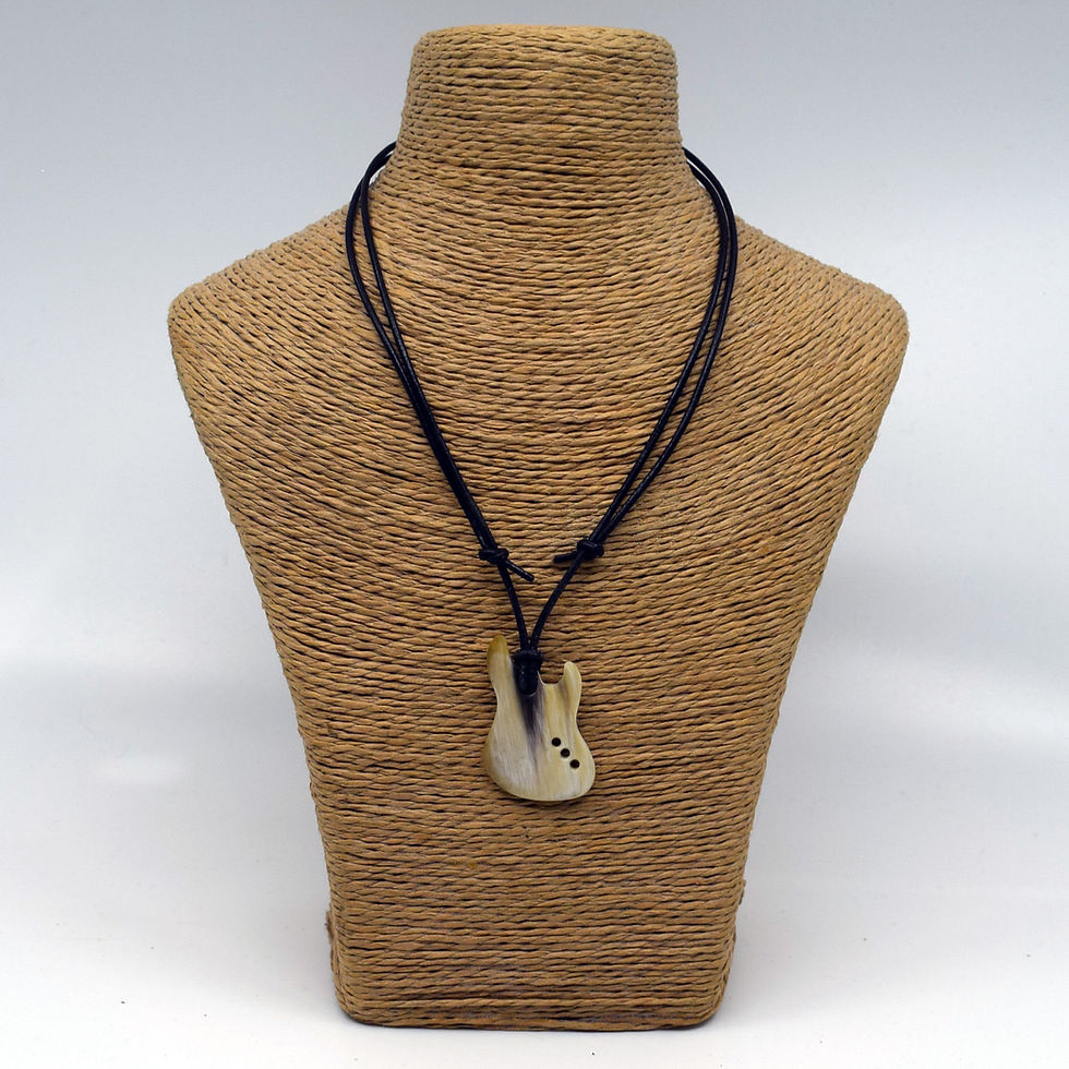 Thumbnail: J Bass pendant in cow horn