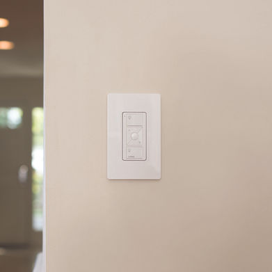 Surface-mounted controls install flush within a standard wall plate no cutting required.

They can be elegantly placed in a new location or installed alongside existing dimmers.