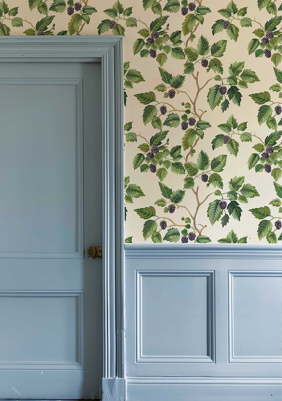 Thumbnail: Bedroom wallpaper with a traditional pattern of green leaves and blackberries.