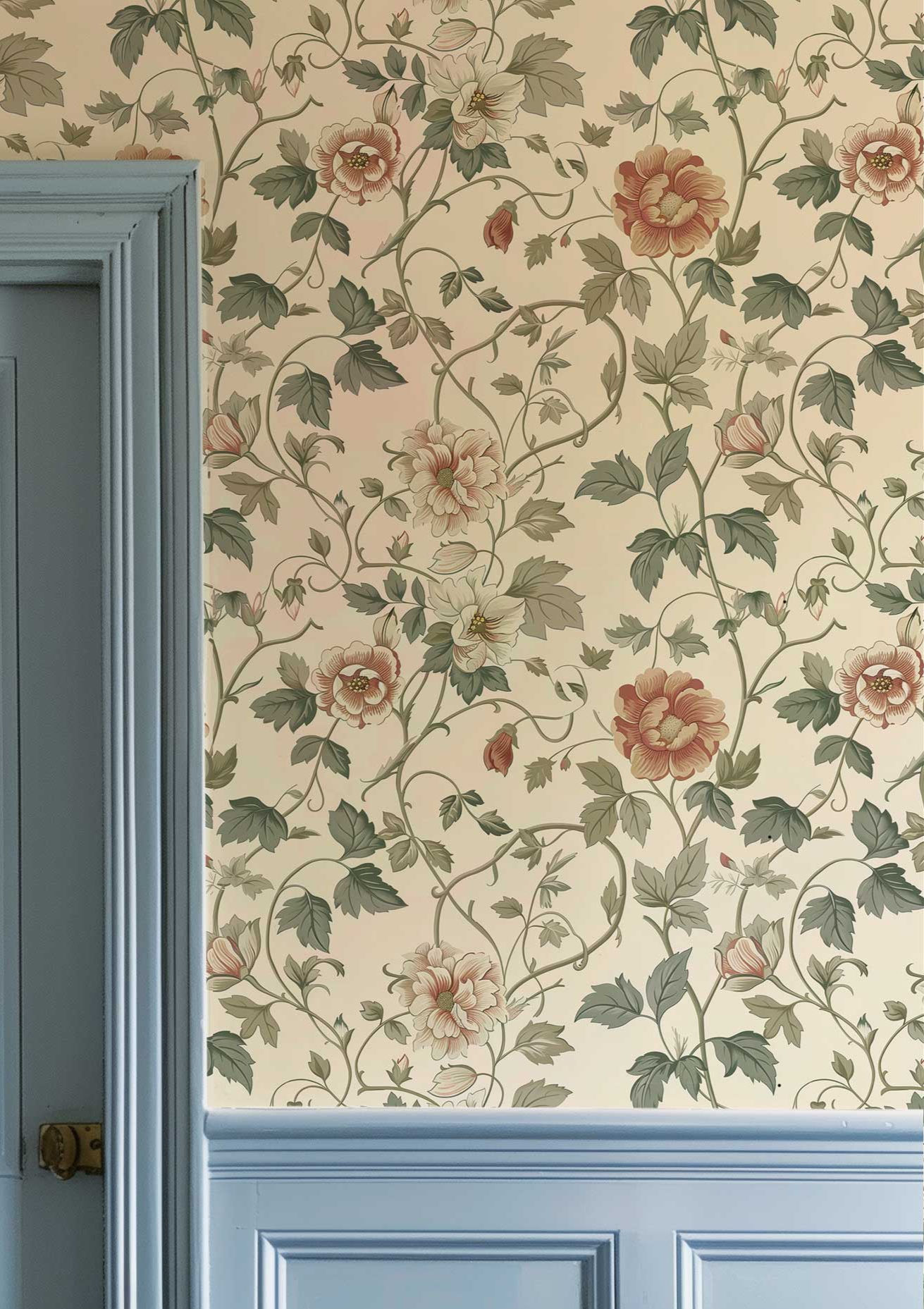 Peel and stick wallpaper with traditional English floral pattern in light muted colors
