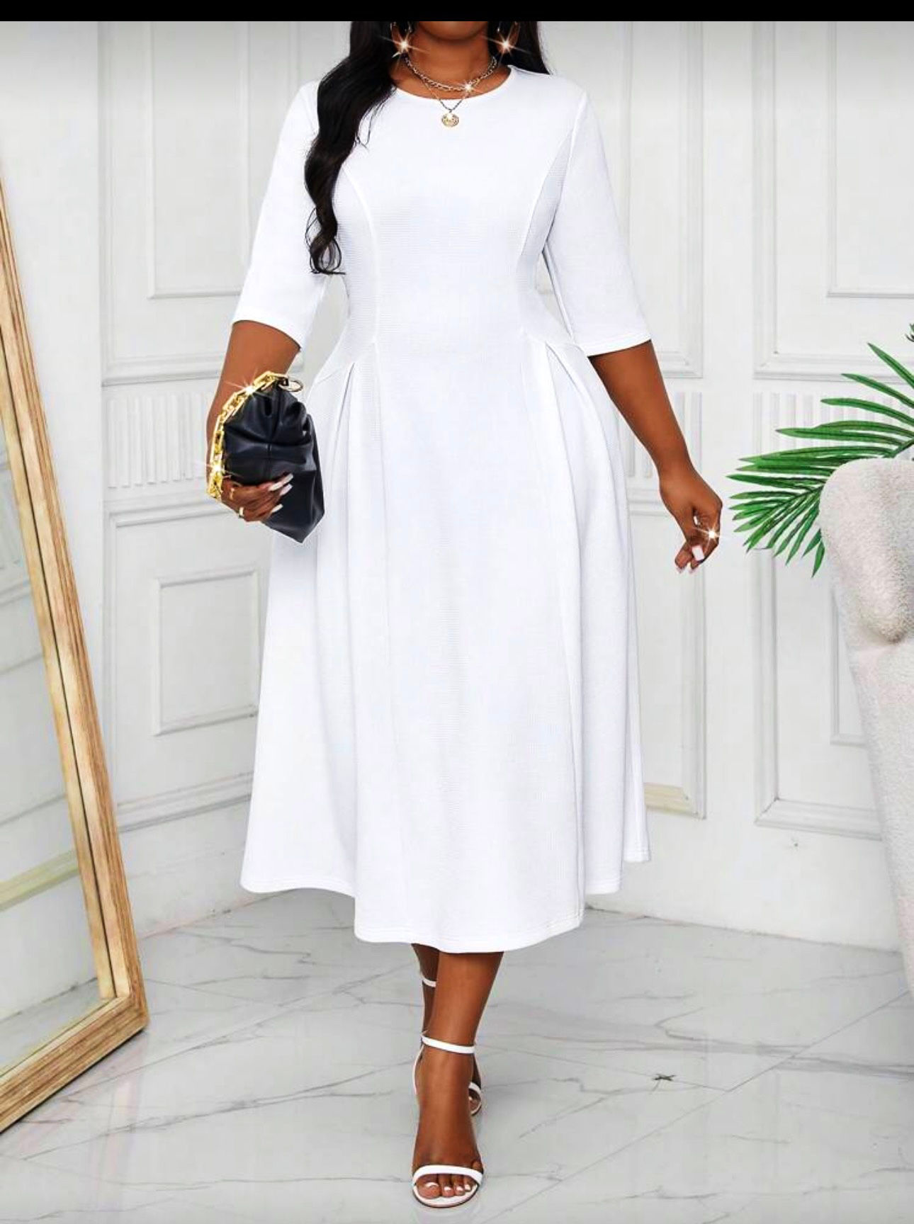White three-quarter length sleeve round neck dress
