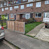 overlap panels concrete posts concrete gravel boards