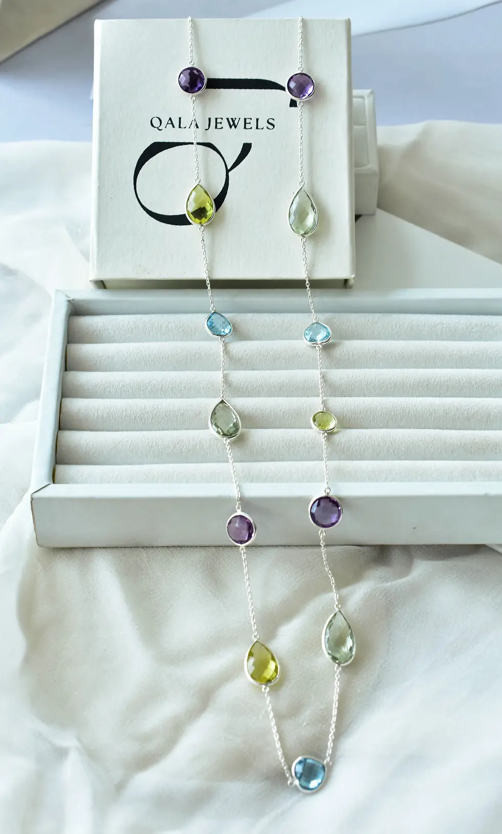 925 sterling silver multi semi-bezel gemstone necklace featuring pastel blue topaz, amethyst, green amethyst, and citrine sto
