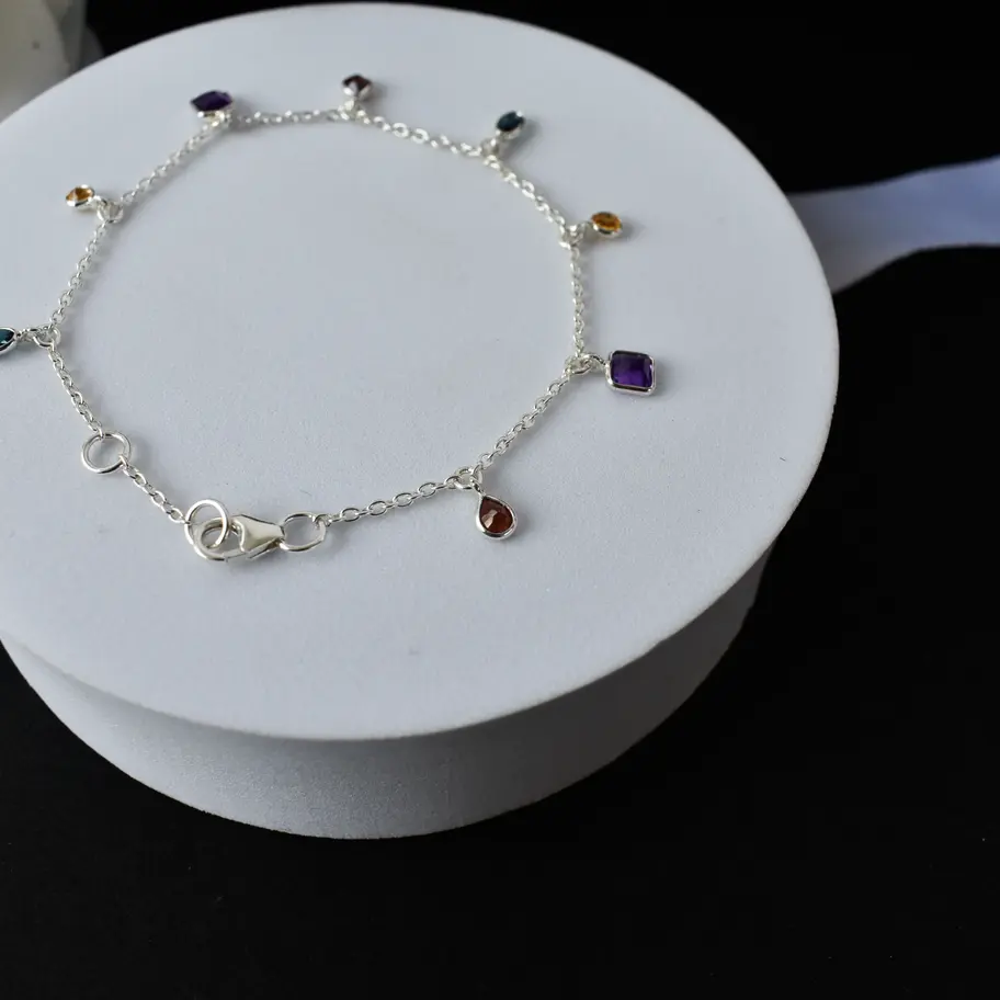 Dainty multi gemstone bracelet with garnet, amethyst, citrine and topaz charms