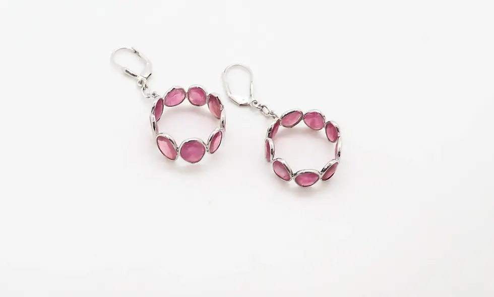 925 sterling silver drop earrings with rectangular pink tourmaline gemstones displayed on a minimal white jewellery stand