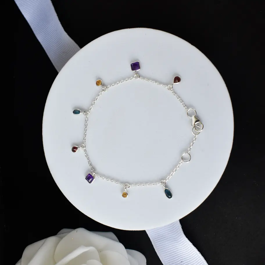 Dainty multi gemstone bracelet with garnet, amethyst, citrine and topaz charms