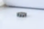 Garnet Blue topaz ring on white background