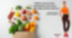 Stephanie Rumble stands confidently in activewear beside a colorful display of fresh fruits, vegetables, and nuts spilling from a grocery bag, alongside her motivational quote about mindset and determination.