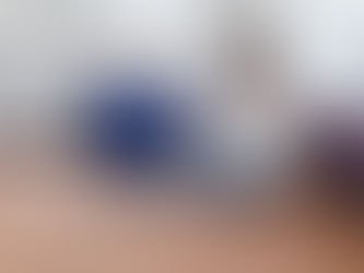 woman sitting on a carpet at home