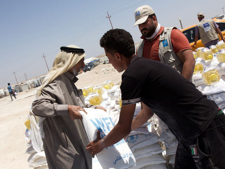 Photo Feature: 'Without this food, we would have nothing but our faith' 