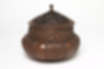 Image of a copper incense burner from the 16th century with decorative floral relief motifs.