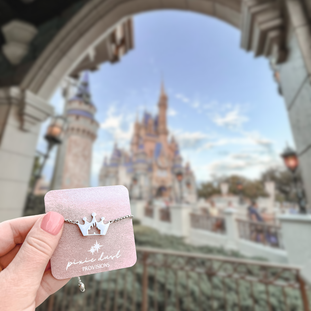 ever after bracelet in silver in front of castle