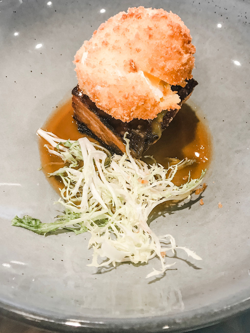 panko crusted egg & braised pork belly from paddlefish in disney springs in disney world, florida